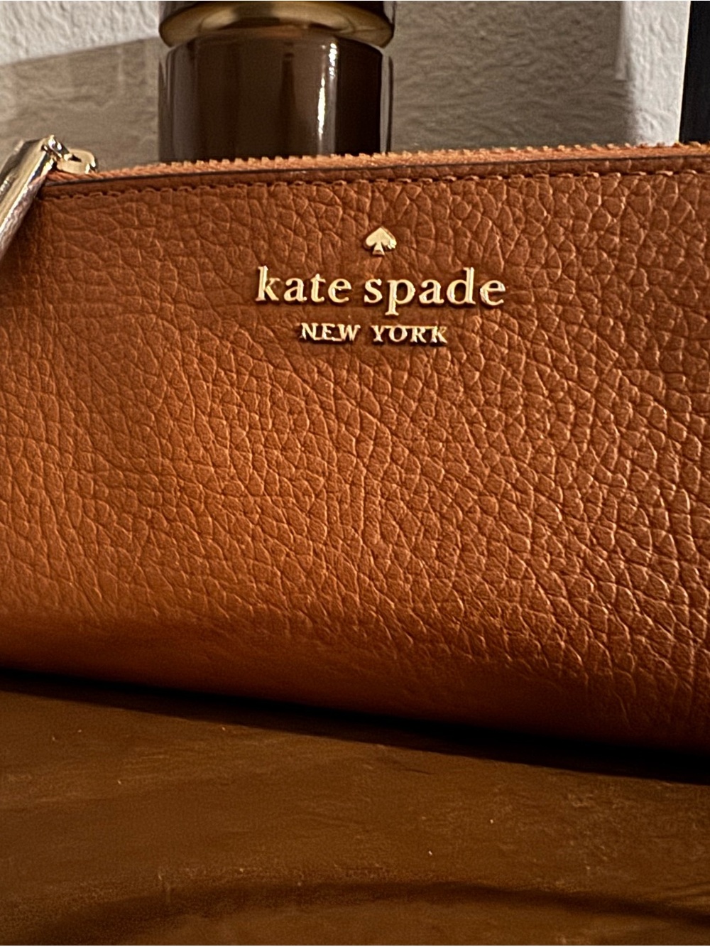 kate spade Pebbled Leather Bi-fold wallet in Cognac Brown with Gold Logo